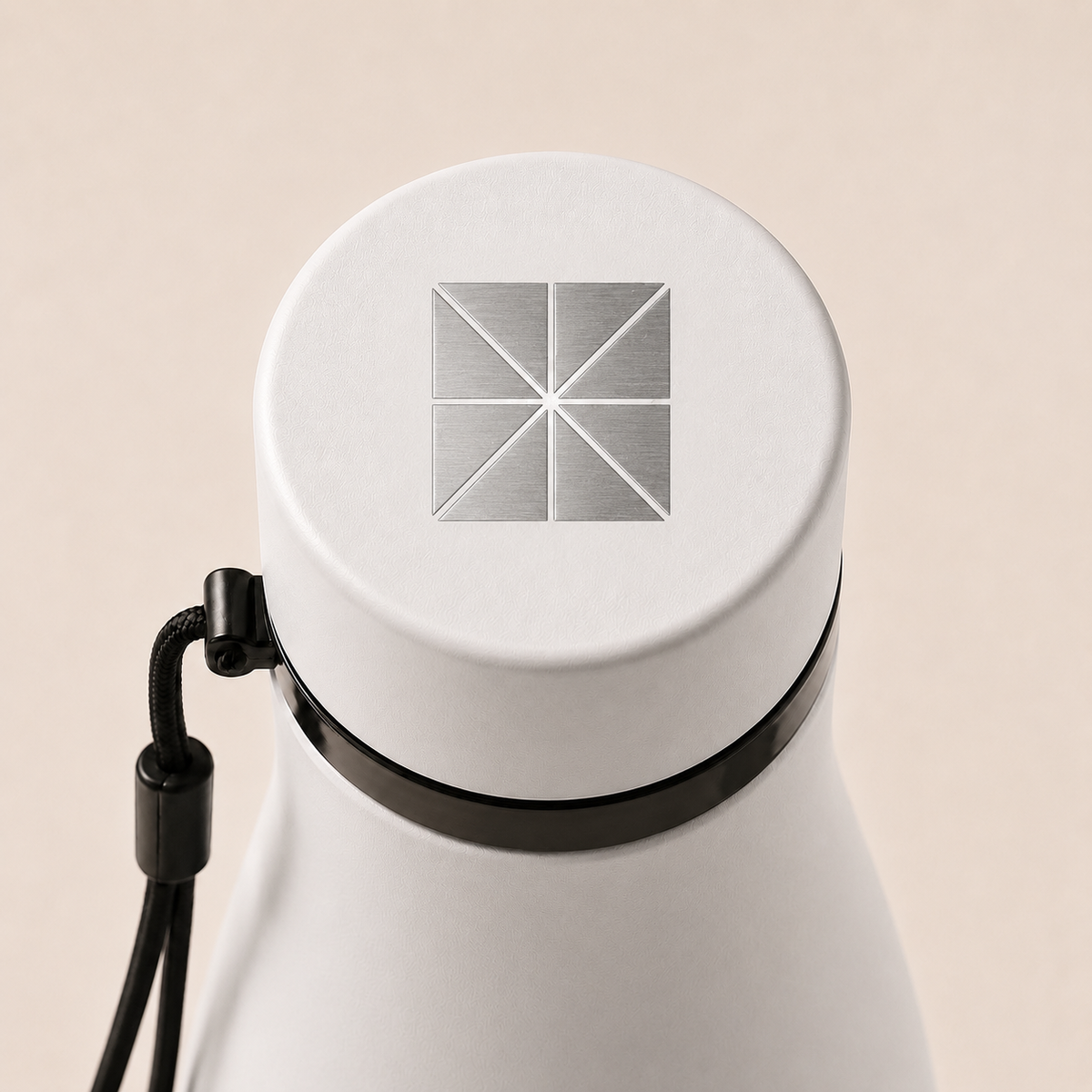 Branded lid detail on a Flask Vessel