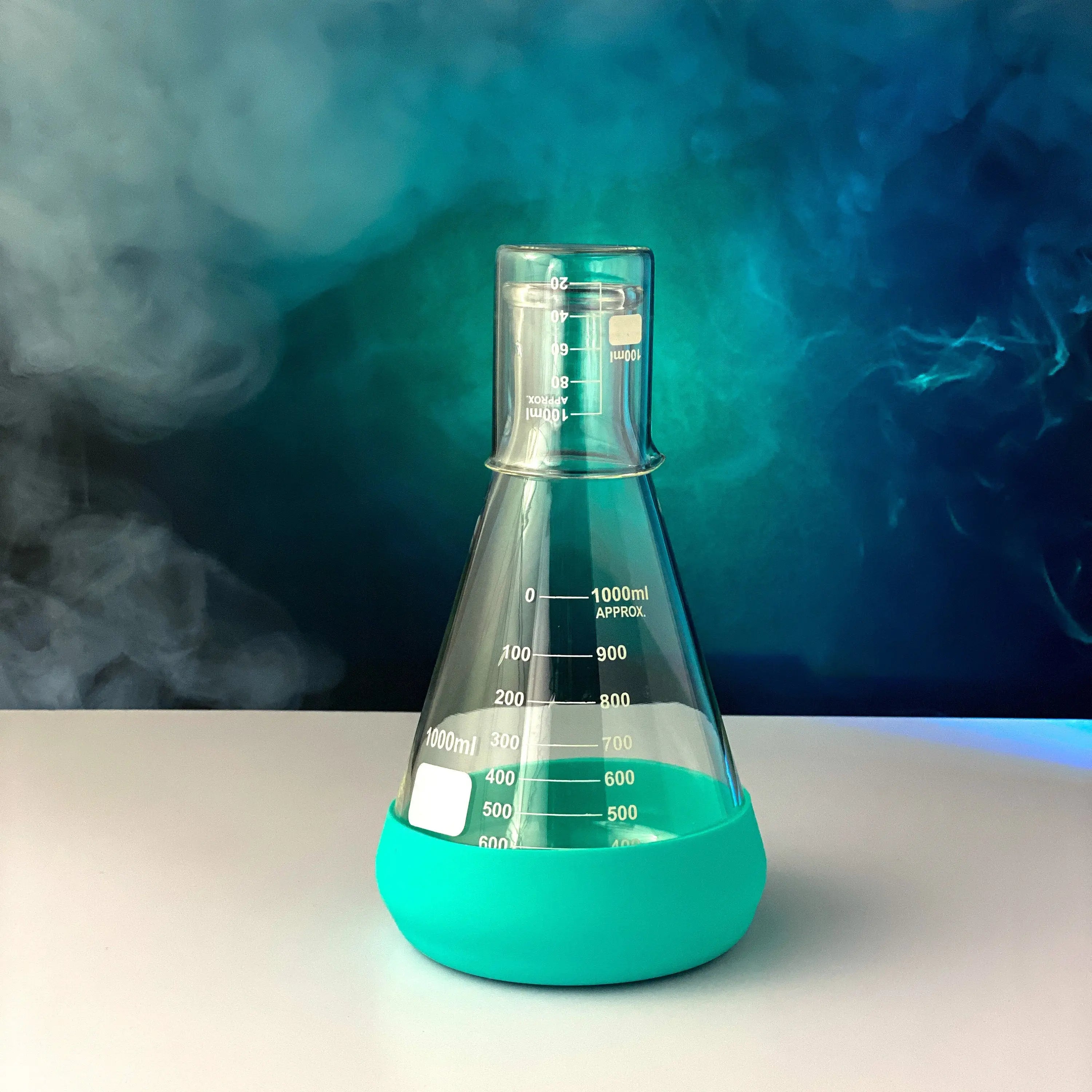 A perfect gift for science lovers, this glass bedside carafe is made from laboratory grade Erlenmeyer flask and beaker drinking cup and accented with food-grade silicone.
