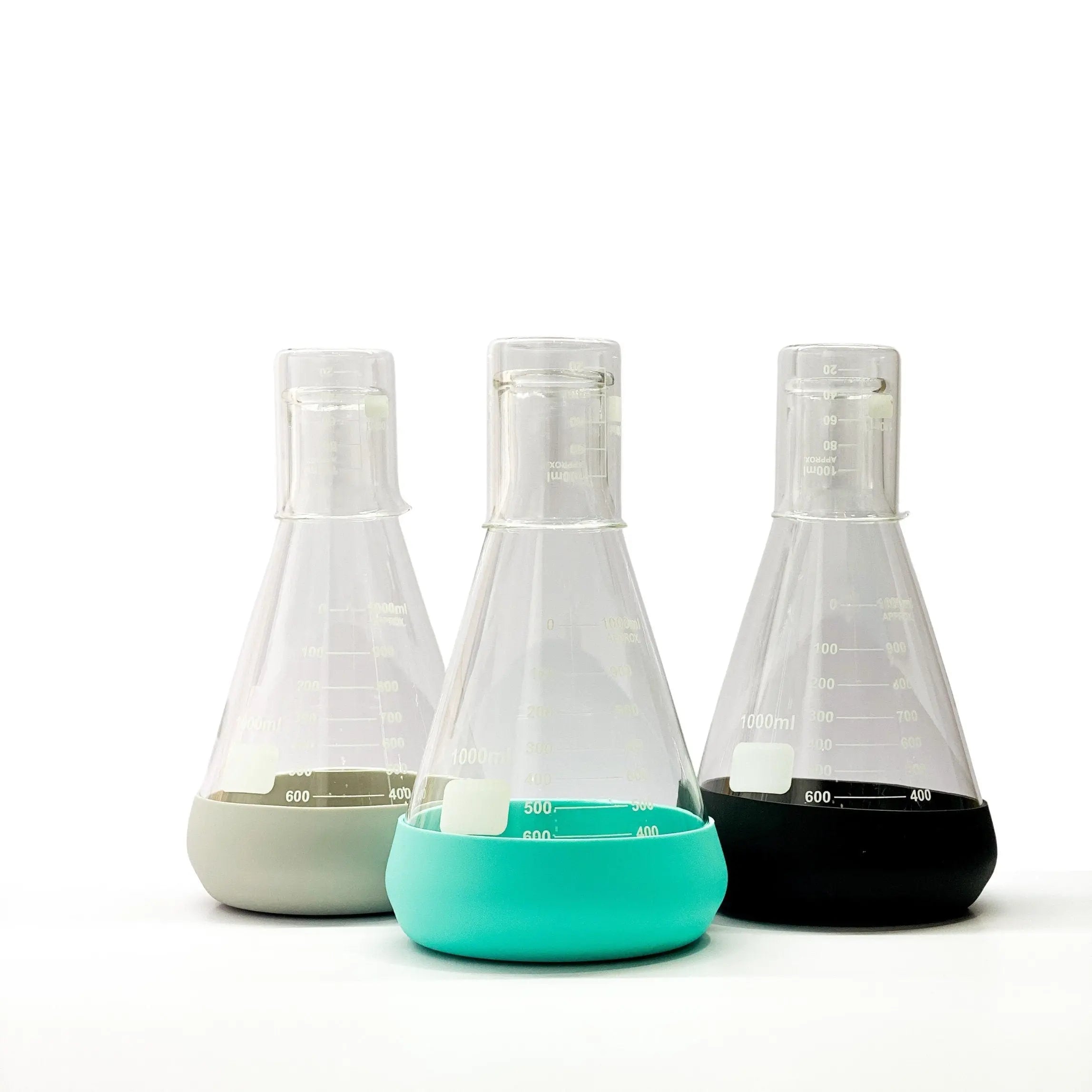 A perfect gift for science lovers, this glass bedside carafe is made from laboratory grade Erlenmeyer flask and beaker drinking cup and accented with food-grade silicone.
