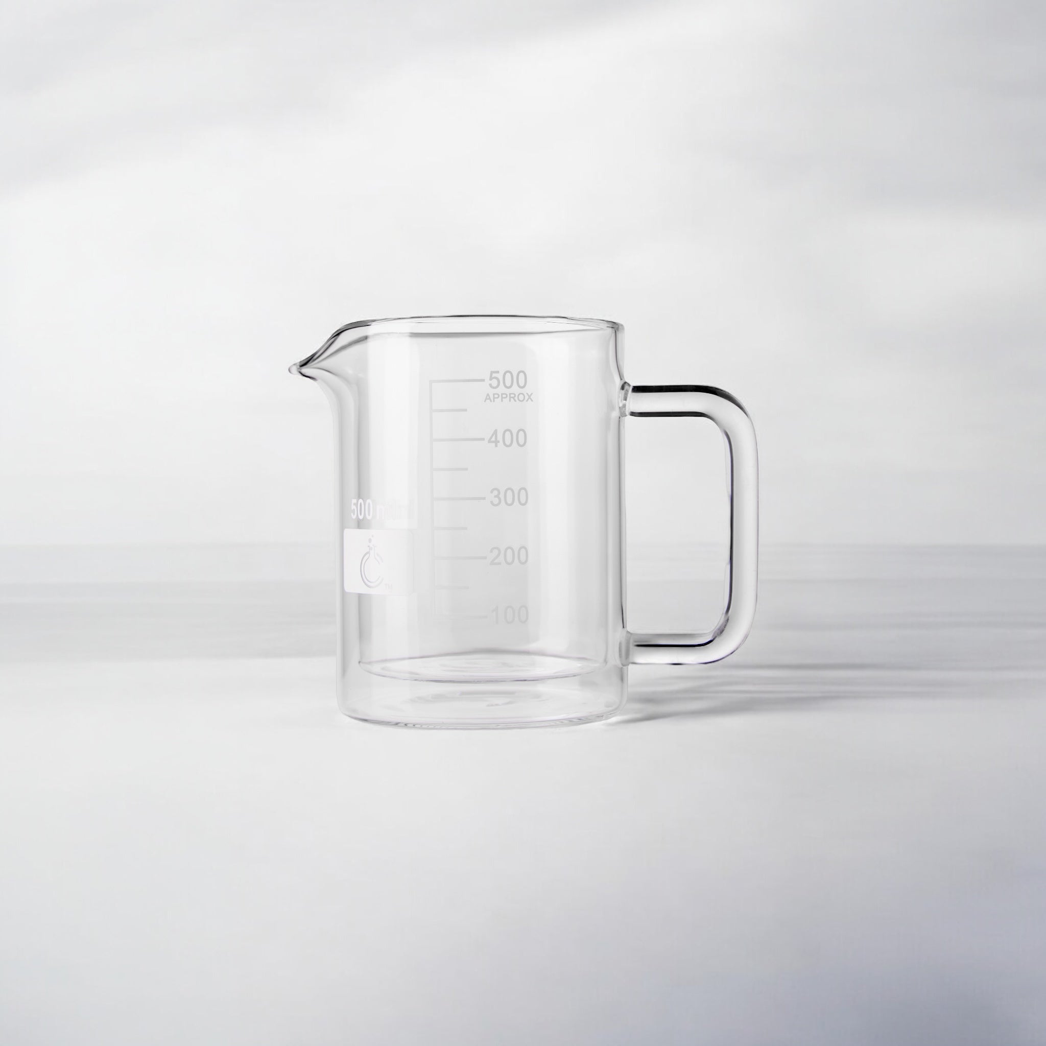 500ml glass beaker coffee mug with handle, featuring measurement markings, a spout for easy pouring, and a laboratory-inspired design, ideal for science-themed drinkware or unique gifts