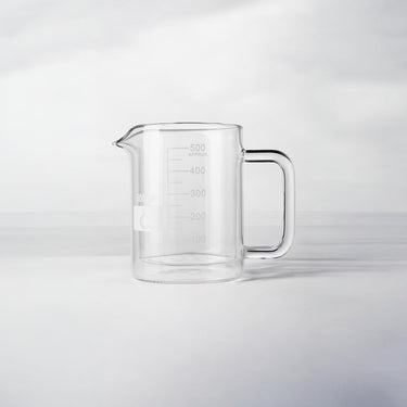 500ml glass beaker coffee mug with handle, featuring measurement markings, a spout for easy pouring, and a laboratory-inspired design, ideal for science-themed drinkware or unique gifts