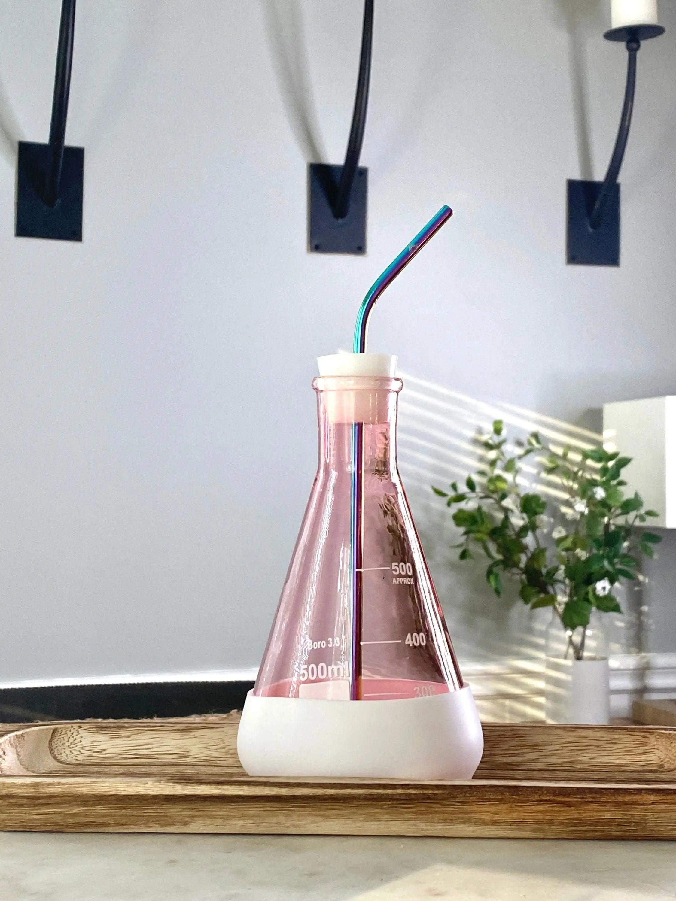 https://thecalculatedchemist.com/cdn/shop/files/Pink-Chemistry-Flask-Drink-Tumbler-_-Silicone-_-Straw-The-Calculated-Chemist-1691085638166.jpg?v=1697023173