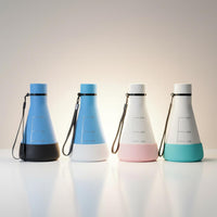 Protective base colour options — four Flask Vessels each fitted with a different silicone base in black, white, pink and turquoise
